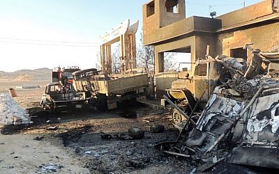 The site of an attack in which 22 Egyptian border guards where killed in al-Wadi al-Gadid, July 2014. (photo credit: AFP/STR)