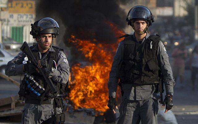 Israeli riot police in Nazareth, on July 21, 2014. (photo credit: AFP/AHMAD GHARABLI)