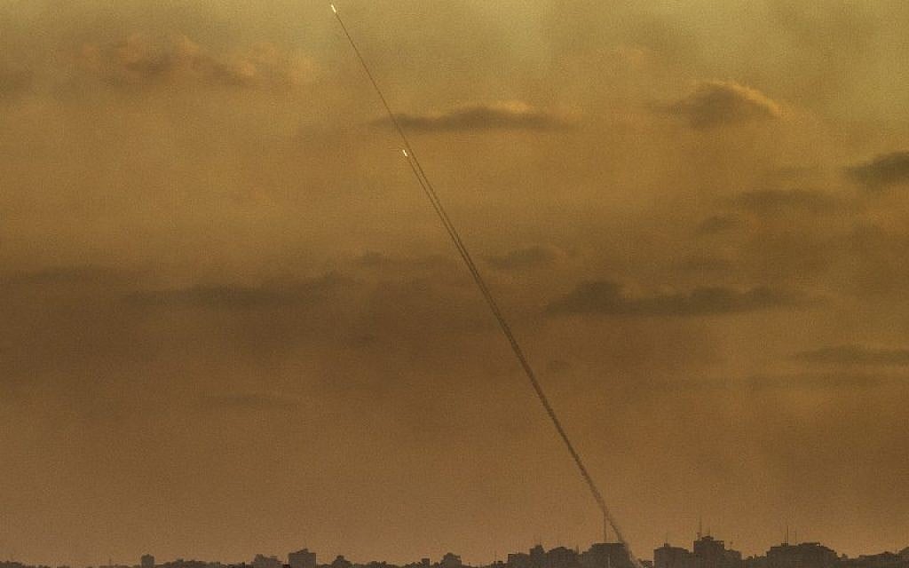 Illustrative. A picture taken from the southern Israeli Gaza border shows rockets being fired from the Gaza Strip into Israel, on July 24, 2014 (JACK GUEZ/AFP)