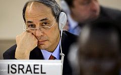 The Permanent Representative of Israel to the United Nations (UN) in Geneva, ambassador Eviatar Manor, attends an emergency session of the UN Human Rights Council on the Gaza crisis at the United Nations Offices in Geneva on July 23, 2014. (photo credit: Fabrice Coffrini/AFP)