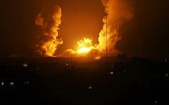 Illustrative: A ball of fire is seen after an Israel airstrike on Rafah, southern Gaza, on July 1, 2014. (photo credit: AFP/Said Khatib)