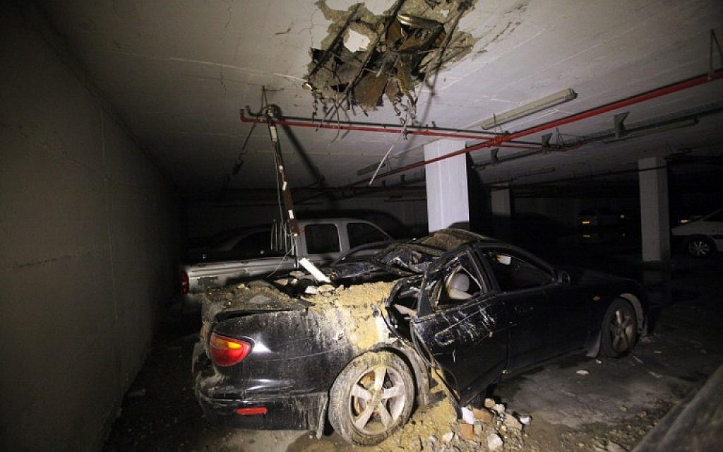 Damage caused by a missile strike in Ashdod on July 8,  2014. (photo credit: AFP/DAVID BUIMOVITCH)