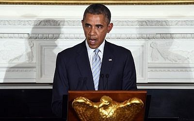 US President Barack Obama speaks as he hosts an Iftar dinner in the State Dinning Room at the White House in Washington on July 14, 2014. Obama said he hopes Egypt's ceasefire plan can restore calm in Gaza (Photo credit: Jewel Samad/AFP)