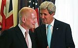 British Foreign Secretary William Hague (L) talks with US Secretary of State John Kerry (R) during a bilateral meeting during talks between the foreign ministers of the six powers negotiating with Tehran on its nuclear program, in Vienna, on July 13, 2014. (photo credit: JIM BOURG/POOL/AFP)