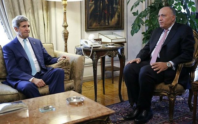 US Secretary of State John Kerry meets with Egypt's Foreign Minister Sameh Shukri in Cairo on July 22, 2014. (photo credit: AFP) US Secretary of State John Kerry meets with Egypt's Foreign Minister Sameh Shukri in Cairo on July 22, 2014. (photo credit: AFP)