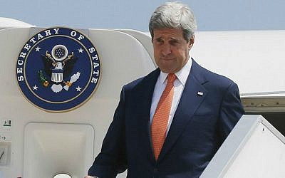 US Secretary of State John Kerry steps out from his plane at Ben Gurion airport as he arrives in Israel on July 23, 2014. (file photo credit: AFP/STR)