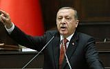 Turkish Prime Minister Recep Tayyip Erdogan in the parliament in Ankara, July 15, 2014  (photo credit: AFP/ADEM ALTAN)