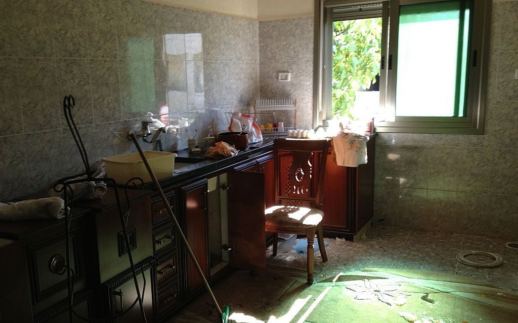 The destroyed kitchen at the Abu Aysha home in Hebron, July 1, 2014 (photo credit: Elhanan Miller)