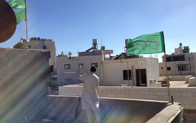 The rooftop of the Qawasmeh home in Hebron, where a Hamas flag was placed on Tuesday, July 1, 2014 (photo credit: Elhanan Miller/Times of Israel)
