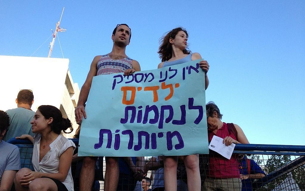 Demonstrators at a Tag Meir rally hold up a sign reading 'We don't have enough children for futile revenge,'in Jerusalem on July 2, 2014. (photo credit: Elhanan Miller/Times of Israel) Demonstrators at a Tag Meir rally hold up a sign reading 'We don't have enough children for futile revenge,'in Jerusalem on July 2, 2014. (photo credit: Elhanan Miller/Times of Israel)