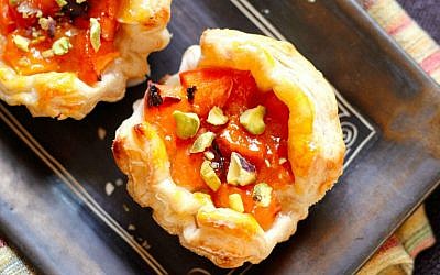 Fresh apricots, jam and pistachio pieces in a homemade pastry (photo credit: Andrea Brownstein/Photoli Photography)