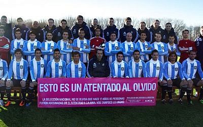 Players from Argentina’s national soccer team holding up a banner commemorating victims of the 1994 AMIA bombing. (JTA)