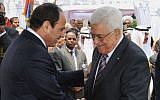 Egyptian President Abdel-Fattah el-Sissi, left, greets Palestinian Authority President Mahmoud Abbas during his inauguration ceremony at the presidential palace in Cairo, Egypt, on June 8, 2014. (AP/MENA)