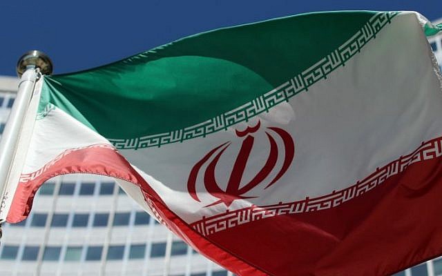 The Iranian flag flies in front of a UN building, Friday, July 4, 2014. (AP/Ronald Zak)