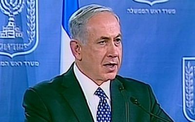 Prime Minister Benjamin Netanyahu addresses the press ahead of consultations at the Kirya military headquarters in Tel Aviv, Tuesday, June 15, 2014 (screen capture: Channel 2)