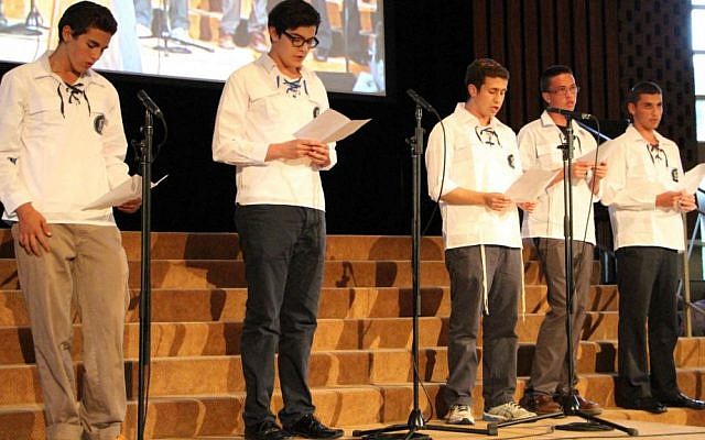 Religious youth group Bnei Akiva sings 'Acheinu' ('Our Brothers') at Toronto memorial service for slain Israeli teens. (Courtesy) Religious youth group Bnei Akiva sings 'Acheinu' ('Our Brothers') at Toronto memorial service for slain Israeli teens. (Courtesy)