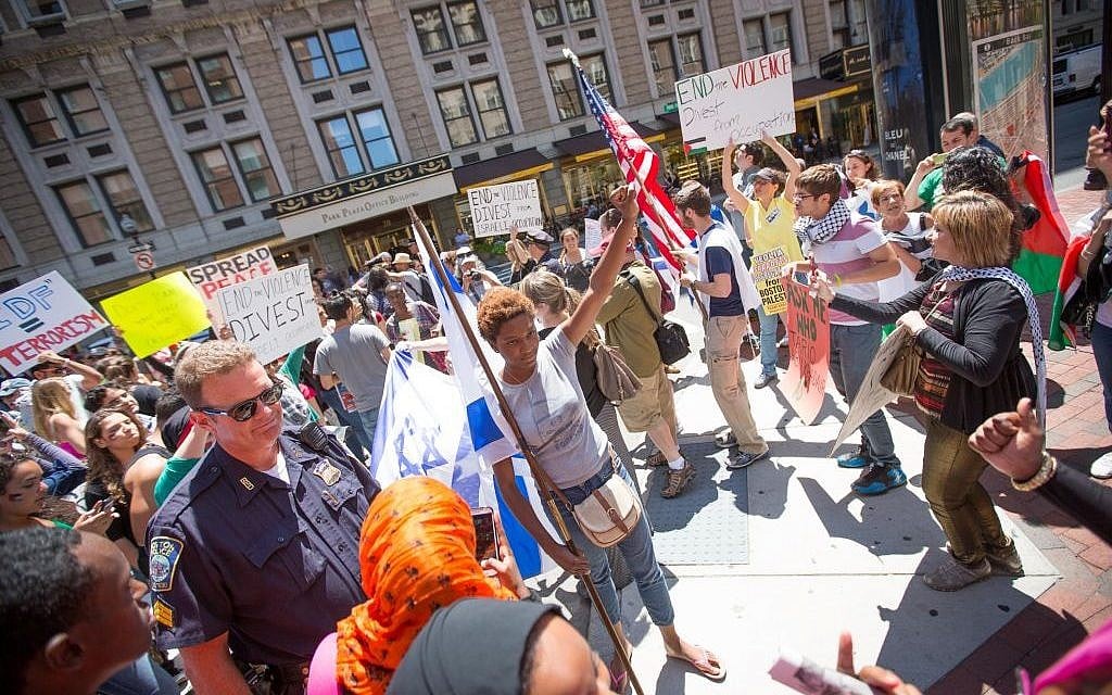 Illustrative: At an anti-Israel protest in Boston on July 11, 2014, pro-Palestinian activists surrounded several Israel supporters, hurling insults and allegedly physically assaulting pro-Israel students (photo credit: Elan Kawesch/The Times of Israel) Illustrative: At an anti-Israel protest in Boston on July 11, 2014, pro-Palestinian activists surrounded several Israel supporters, hurling insults and allegedly physically assaulting pro-Israel students (photo credit: Elan Kawesch/The Times of Israel)