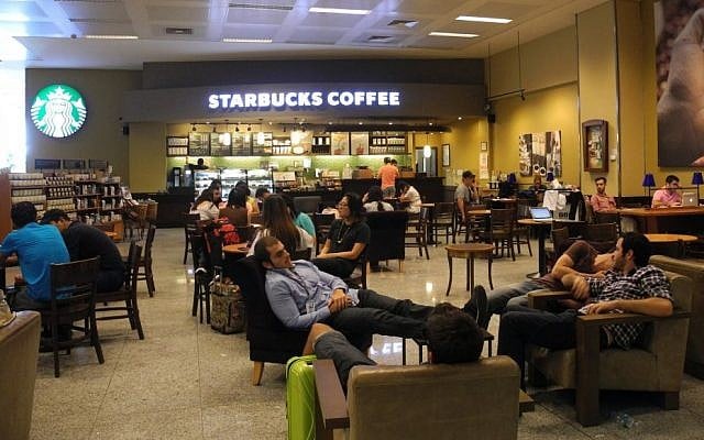 The Starbucks near the Turkish Airline Hotels desk was the site of a waiting game for people affected by flight cancellations.