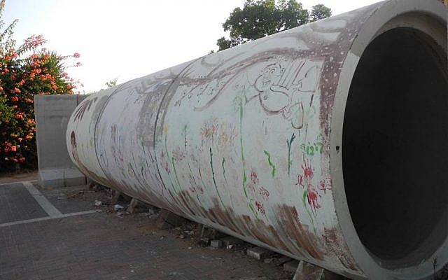 A painted reinforced concrete pipe serves as a bomb shelter for up to three families in Nitzan. A painted reinforced concrete pipe serves as a bomb shelter for up to three families in Nitzan. photo credit: Melanie Lidman/Times of Israel)