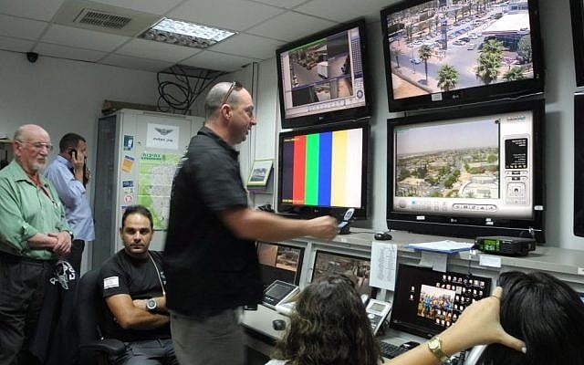 Erez Tidhari, the director of security for the town of Netivot, at the security control center next to the municipality building.  (Melanie Lidman/Times of Israel)