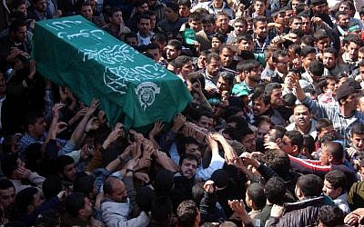 The funeral of Hamas leader Sheikh Ahmad Yassin in Gaza, March 2004 photo credit: Flash90)