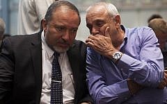Foreign Minister Avigdor Lieberman (left) speaks to Public Security Minister Yitzhak Aharonovitch during a Yisrael Beytenu event, September 1, 2013. (photo credit: Yonatan Sindel/Flash90)
