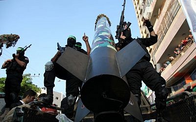 Hamas militants display the M-75 rocket in a military parade commemorating Operation Pillar of Defense in Gaza, November 14, 2013 (photo credit: Emad Nassar/Flash90) Hamas militants display the M-75 rocket in a military parade commemorating Operation Pillar of Defense in Gaza, November 14, 2013 (photo credit: Emad Nassar/Flash90)
