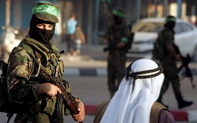 An Al-Qassam Brigades gunman in Gaza, May 2014 photo credit: Abed Rahim Khatib/Flash90)