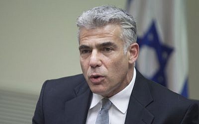 Finance Minister Yair Lapid, speaks during a meeting of his Yesh Atid faction  at the Knesset, on June 30, 2014. (photo credit: Flash90)
