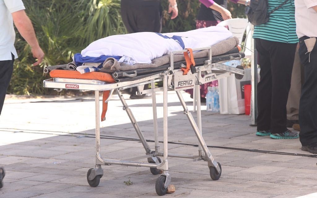 The body of Gil-ad Sha'ar, 16, wrapped in the Israeli flag, is led at a funeral procession ceremony held in his family's hometown of Talmon, on July 1, 2014. (photo credit: Flash90) The body of Gil-ad Sha'ar, 16, wrapped in the Israeli flag, is led at a funeral procession ceremony held in his family's hometown of Talmon, on July 1, 2014. (photo credit: Flash90)