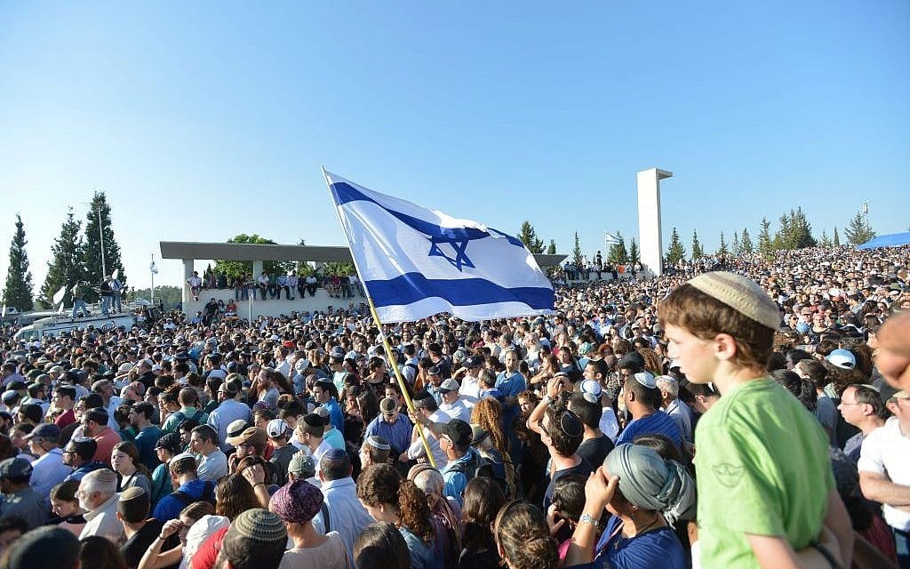 Tens of thousands of people at the funeral for Gil-ad Shaar, Naftali Fraenkel and Eyal Yifrach in Modiin (photo credit: Flash90) Tens of thousands of people at the funeral for Gil-ad Shaar, Naftali Fraenkel and Eyal Yifrach in Modiin (photo credit: Flash90)