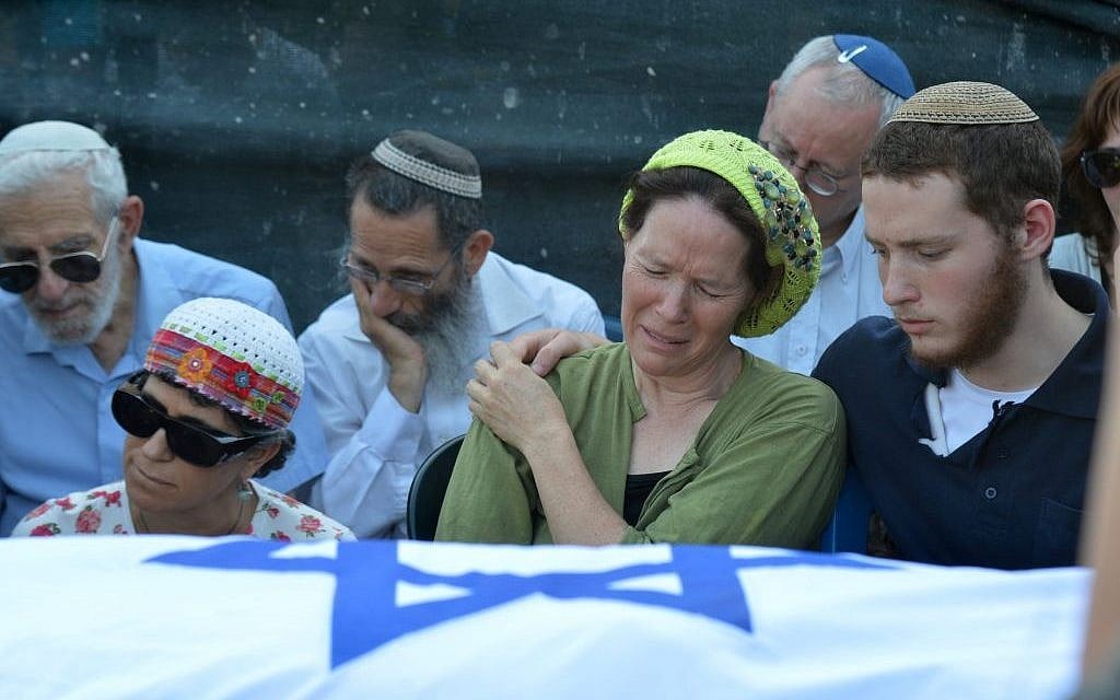 Rachelle Fraenkel crying over the body of her son Naftali at his funeral, July 2014 (photo credit: Flash90) Rachelle Fraenkel crying over the body of her son Naftali at his funeral, July 2014 (photo credit: Flash90)