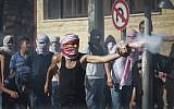 Palestinians clash with Israeli border police in the East Jerusalem neighborhood of Shuafat after the body of a Palestinian teen from East Jerusalem is found in the Jerusalem Forest, Wednesday, July 2, 2014. (photo credit: Hadas Parush/Flash90)
