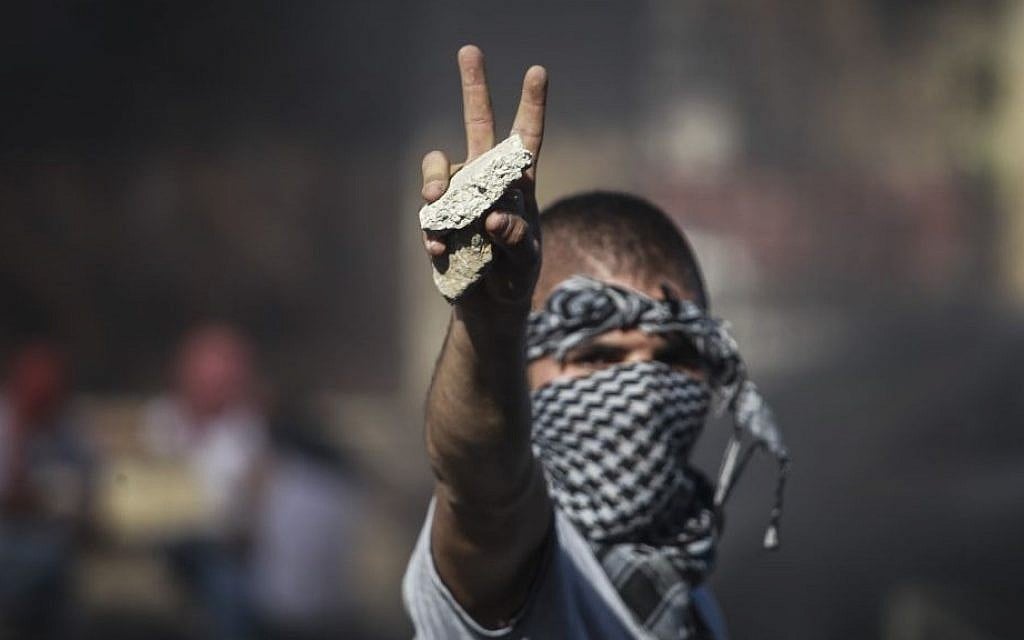 Palestinians clash with Israeli border police in the East Jerusalem neighborhood of Shuafat after the body of a Palestinian teen from East Jerusalem is found in the Jerusalem Forest, Wednesday, July 2, 2014. (photo credit: Hadas Parush/Flash90)