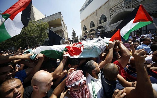 Palestinians carry the body of 16-year-old Muhammed Abu Khdeir during his funeral in the Arab neighborhood of Shuafat, East Jerusalem on July 4, 2014 photo credit: Sliman Khader/Flash90) Palestinians carry the body of 16-year-old Muhammed Abu Khdeir during his funeral in the Arab neighborhood of Shuafat, East Jerusalem on July 4, 2014 photo credit: Sliman Khader/Flash90)