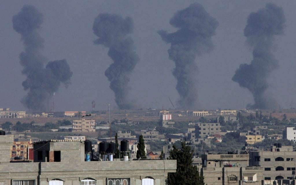 Black smoke rises after an Israeli air strike on the Gaza International Airport in Rafah, southern Gaza, on July 7, 2014. (photo credit: Abed Rahim Khatib/Flash90)