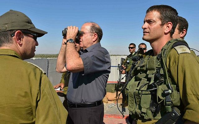 Defense Minister Moshe Ya'alon seen during a visit at the Gaza Division of the IDF Southern Command, July 8, 2014. (photo credit: Ariel Hermoni/Ministry of Defense/Flash90) Defense Minister Moshe Ya'alon seen during a visit at the Gaza Division of the IDF Southern Command, July 8, 2014. (photo credit: Ariel Hermoni/Ministry of Defense/Flash90)