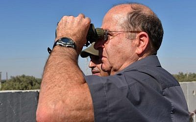 Defense Minister Moshe Ya'alon seen during a visit at the IDF Southern Command of the Gaza Division on July 8, 2014. (Ariel Hermoni/Ministry of Defense/Flash90)