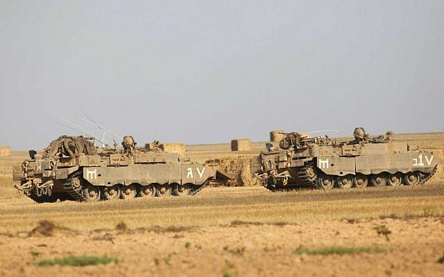 IDF infantry forces seen near the Gaza border in southern Israel on the first day of Operation Protective Edge, July 8, 2014. (photo credit: David Buimovitch/Flash90)