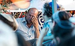 The father of Muhammad Abu Khdeir is seen in the family mourning tent in the East Jerusalem neighborhood of Shuafat, Tuesday, July 8, 2013 (photo credit: Noam Revkin Fenton/Flash90)