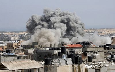 An Israeli missile hits an area in Rafah, southern Gaza Strip, Wednesday, July 9, 2014. (photo credit: Abed Rahim Khatib/Flash90) An Israeli missile hits an area in Rafah, southern Gaza Strip, Wednesday, July 9, 2014. (photo credit: Abed Rahim Khatib/Flash90)