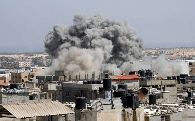 An Israeli missile hits an area in Rafah, southern Gaza Strip, Wednesday, July 9, 2014. (photo credit: Abed Rahim Khatib/Flash90) An Israeli missile hits an area in Rafah, southern Gaza Strip, Wednesday, July 9, 2014. (photo credit: Abed Rahim Khatib/Flash90)
