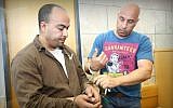 Taxi driver Yousef Hussein Halifa is seen in the Nazareth District Court, where he was indicted for the alleged murder of 19-year-old Shelley Dadon on Wednesday, July 9, 2014. (Hagain Aharon/Flash90)