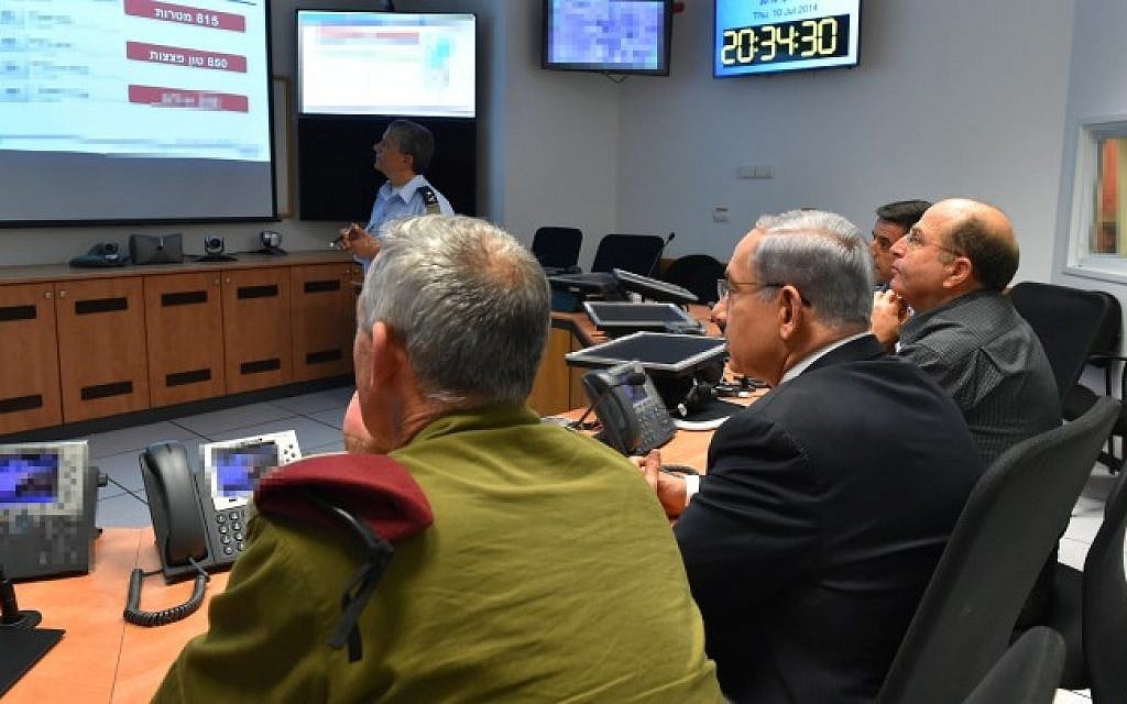 Prime Minister Benjamin Netanyahu (center), Defense Minister Moshe Boogie Ya'alon (right) and IDF Chief of Staff Benny Gantz seen during a meeting at the situation room of the Israeli Air Force on July 10, 2014, on the third day of Operation Protective Edge. (Photo credit: Ariel Hermoni/Ministry of Defense/Flash90)