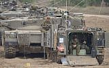 IDF tanks and soldiers in southern Israel near the border with Gaza, on the fourth day of Operation Protective Edge, July 11, 2014. (Photo credit: Gili Yaari/Flash90)