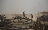 IDF tanks and soldiers in southern Israel near the border with Gaza, on the fifth day of Operation Protective Edge, July 12, 2014. (photo credit: Yonatan Sindel/Flash90)