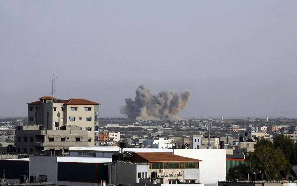 Smoke rises following an Israeli strike on Rafah in the southern Gaza Strip on July 13, 2014. (photo credit: Abed Rahim Khatib/Flash90)