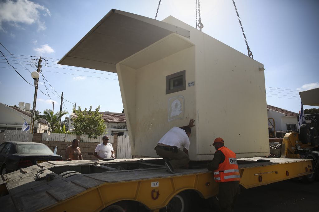Moving a bomb shelter from one location to another in Ashkelon (photo credit: Hadas Parush) Moving a bomb shelter from one location to another in Ashkelon (photo credit: Hadas Parush)