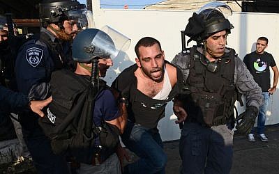 A protester is arrested following the demonstration in Nazareth, July 21, 2014 (photo credit: Flash90)
