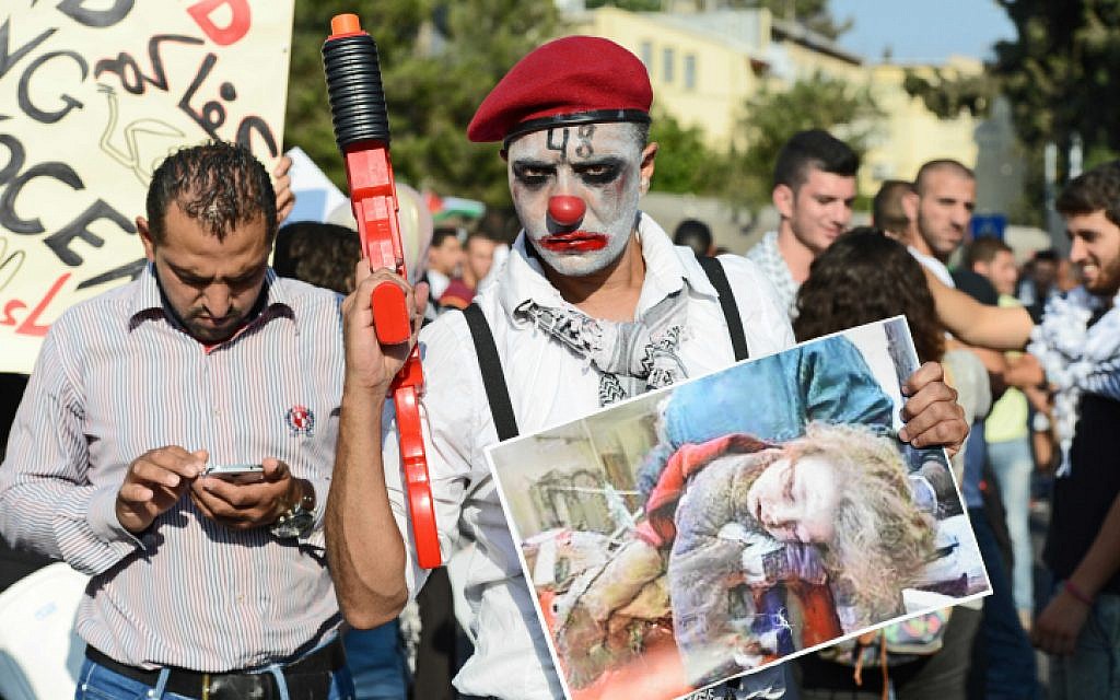 Israeli-Arabs take part in a protest in the northern city of Nazareth, against Israel's offensive in the Gaza Strip July 21, 2014. (photo credit: Flash90)